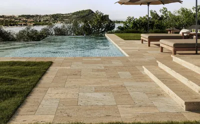 French pattern travertine terrace and pool deck installation